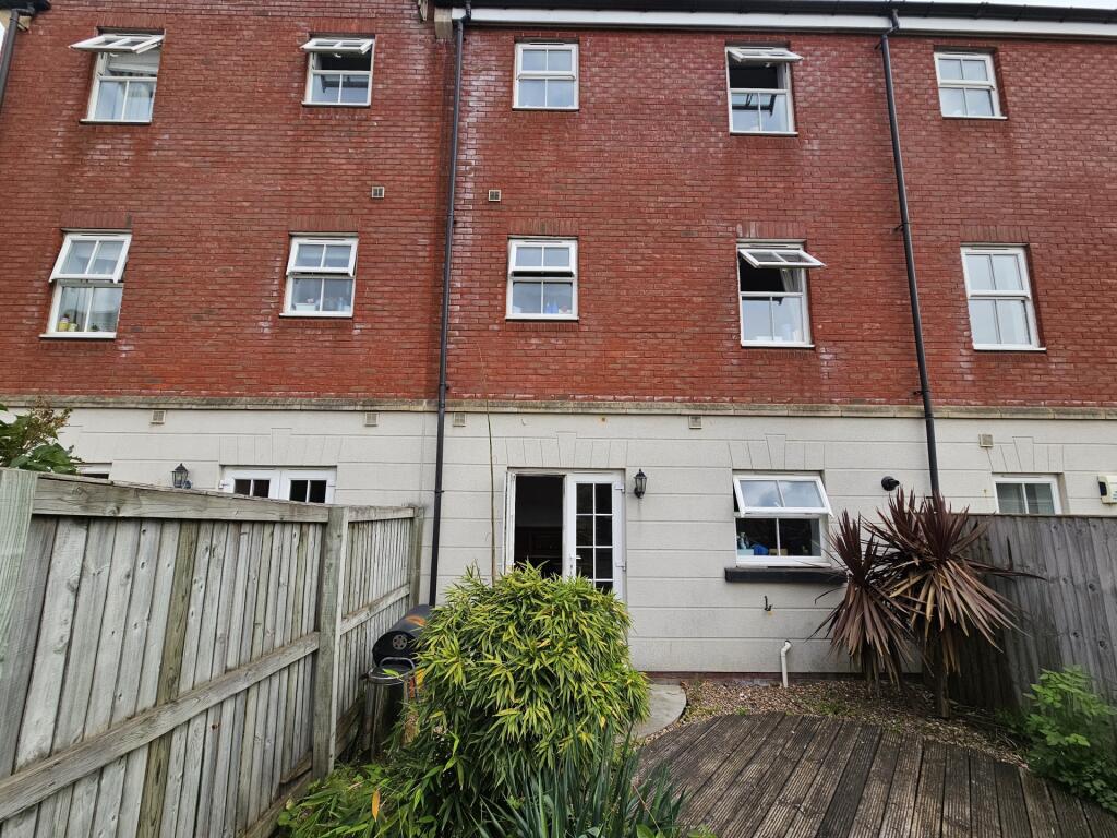 A charming rear view of a terraced student prop...