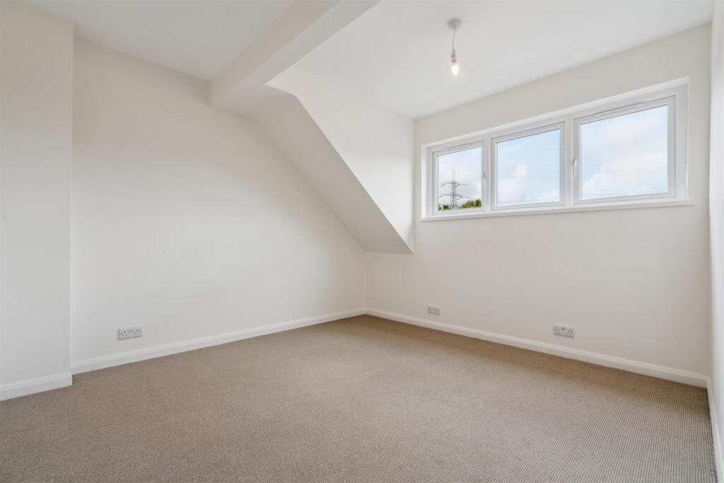 4 Landseer Close SW19 2UT bedroom 2.jpg