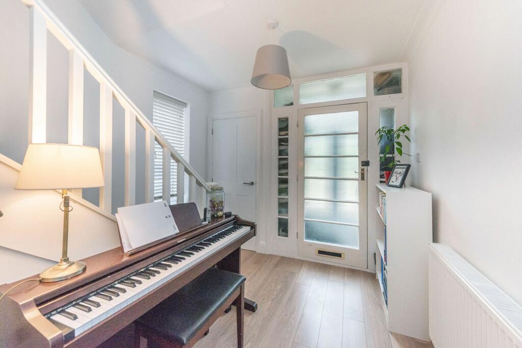 ENTRANCE HALLWAY AND LANDING