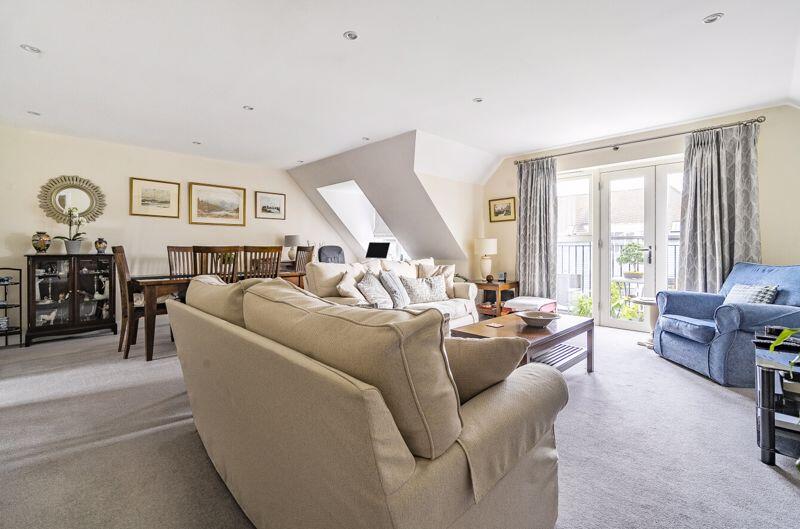 Living/dining room with balcony access