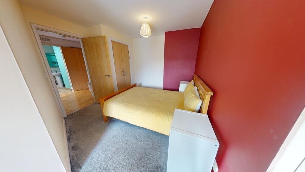 Bright and inviting double bedroom featuring a ...