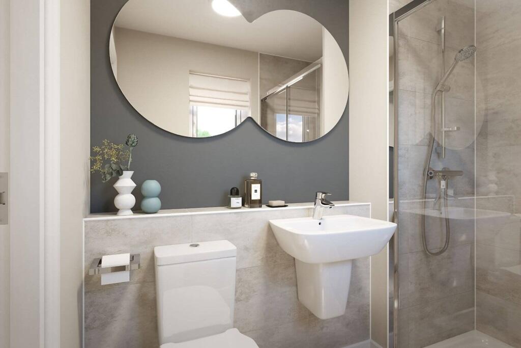 Bed 1 boasts an en suite shower room