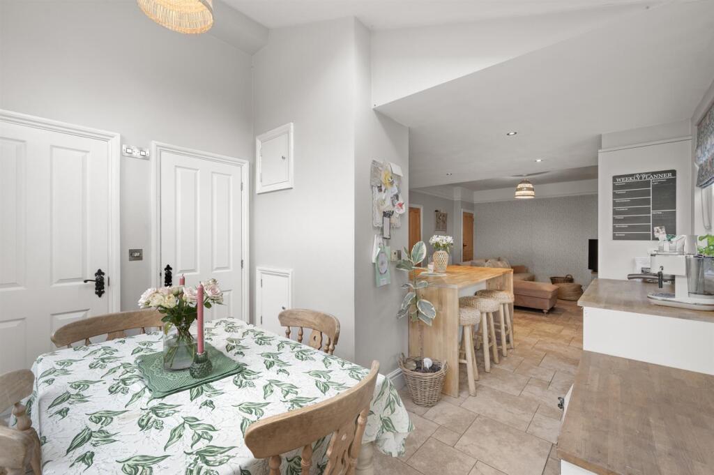 Dining area to kitchen and lounge.jpg