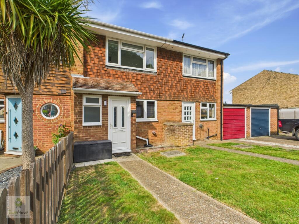 Front Of Property  And Garage Blue Door