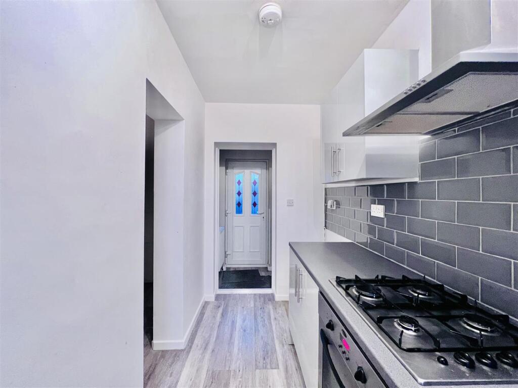 Kitchen And Second Entrance