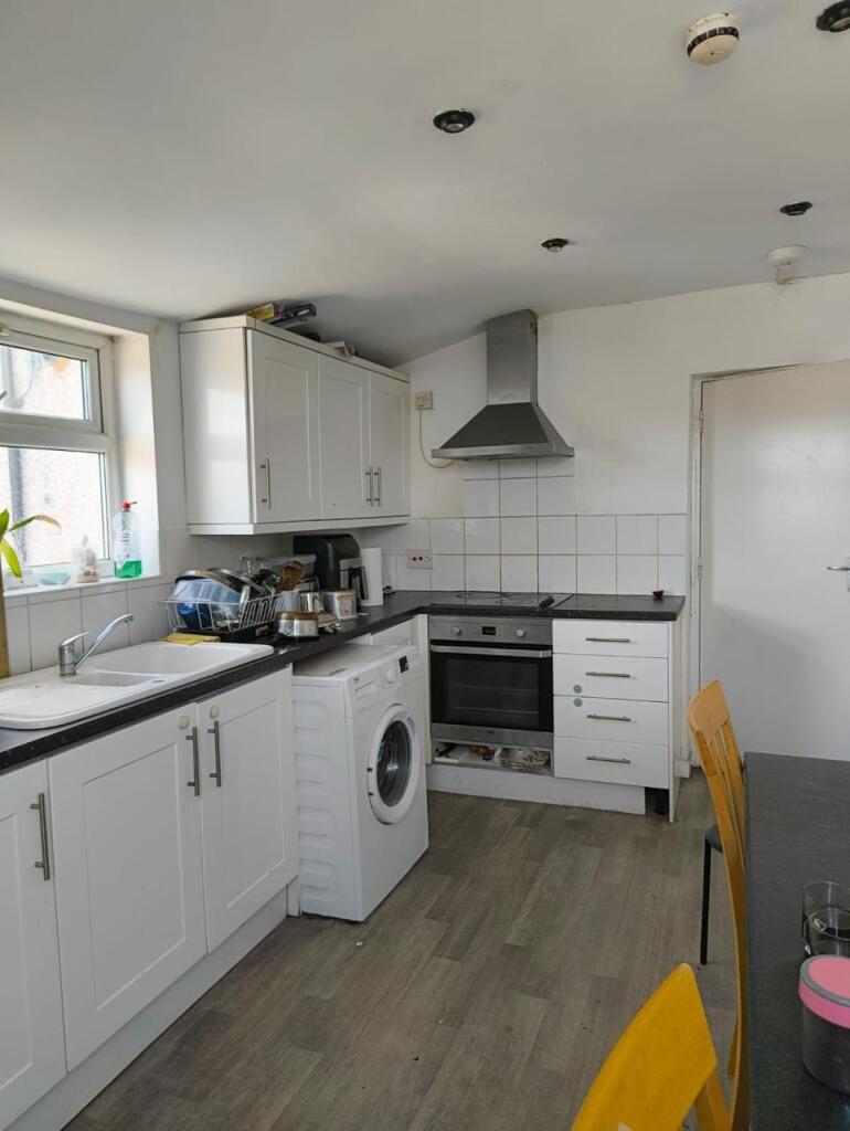 Bright and functional kitchen featuring modern ...