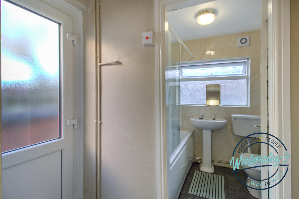Rear door to garden and bathroom