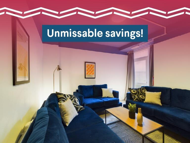 A stylish and spacious living room featuring co...