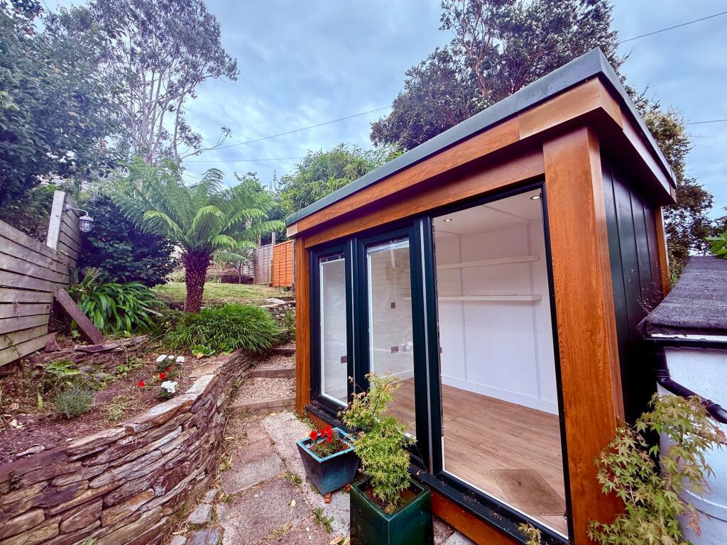 Outdoor office and view of rear garden