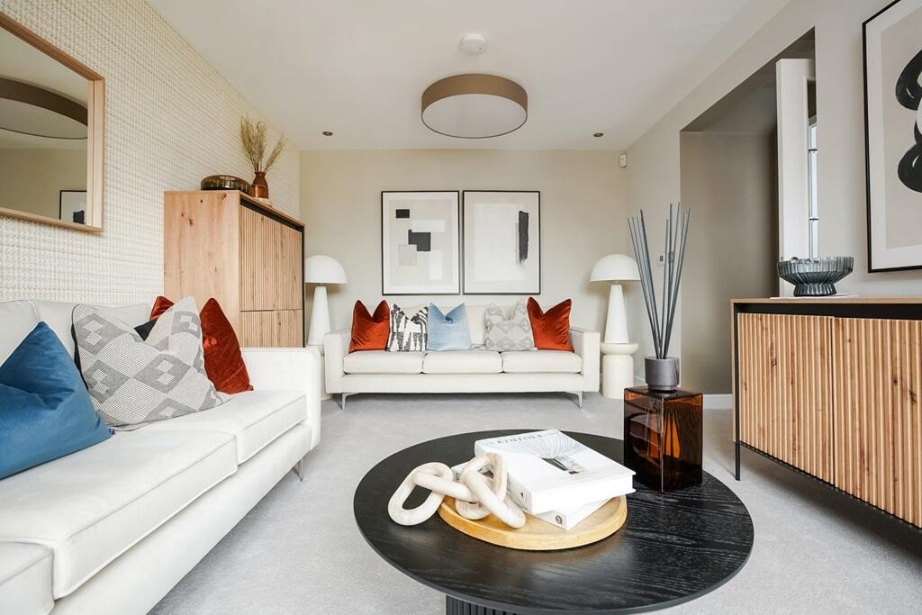 The well-proportioned lounge has space for two 3-seater sofas