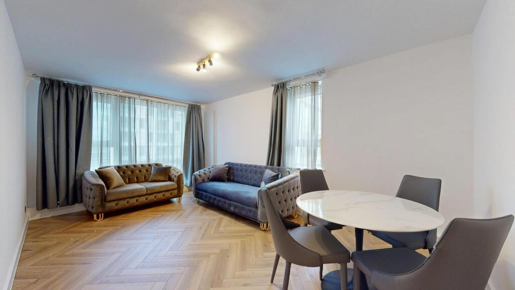 A stylish, modern living room featuring elegant...