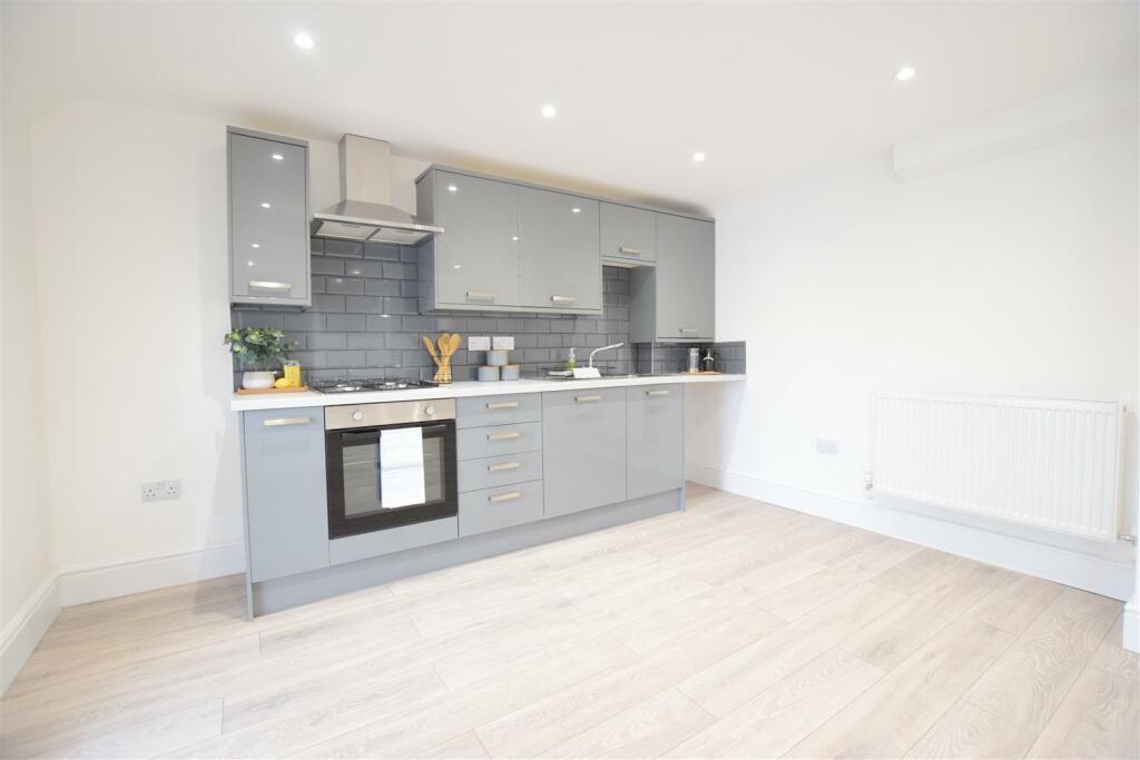 Apt 10 Living Kitchen.JPG