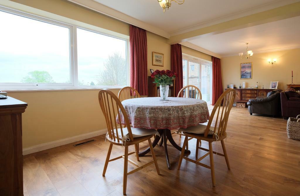 Sunny dining and sitting room
