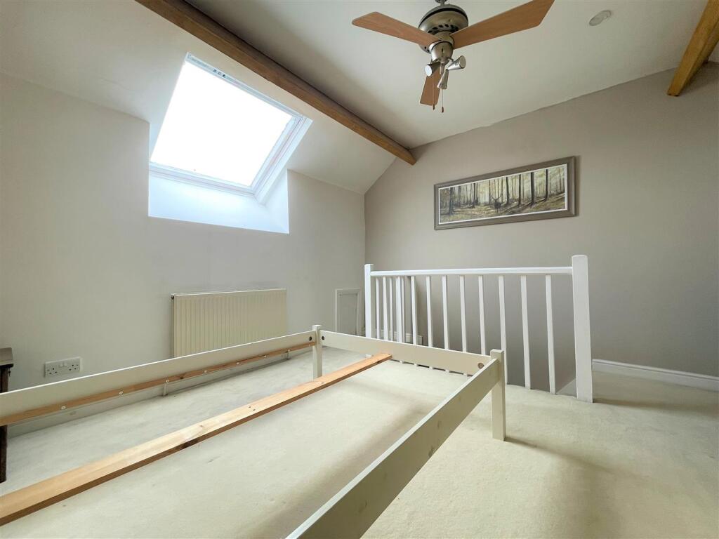 BEDROOM THREE/ATTIC