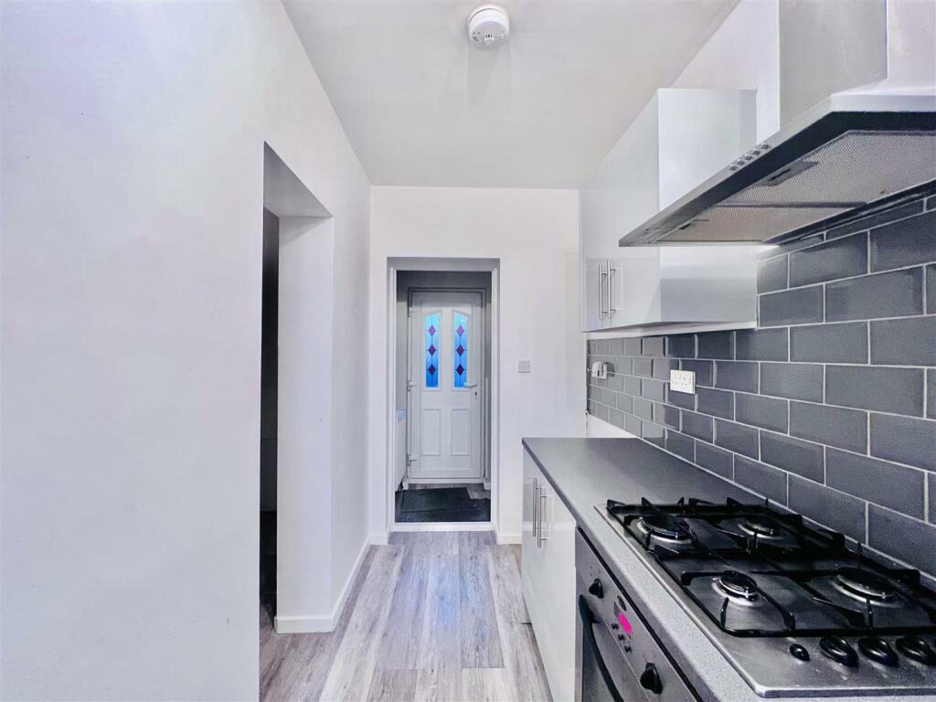 Kitchen And Second Entrance