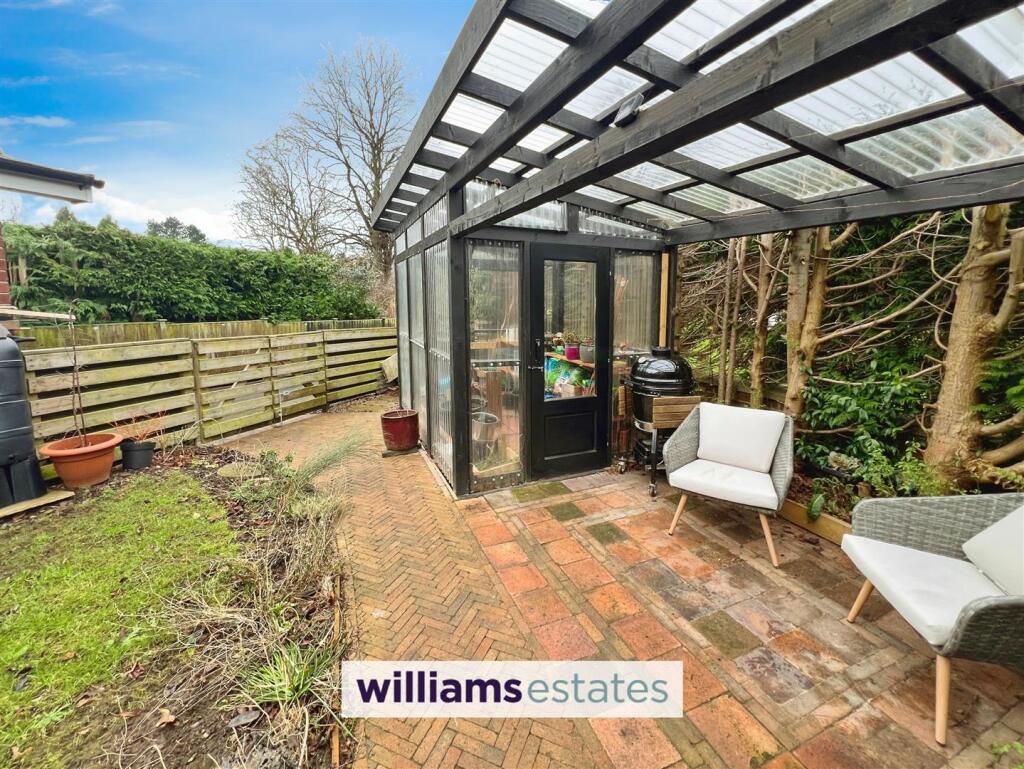 Green House And Patio Area