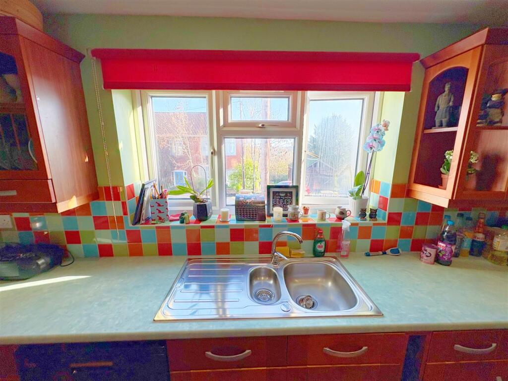 Kitchen window overlooking the driveway.jpg