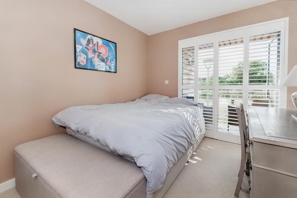 Bedroom three with balcony