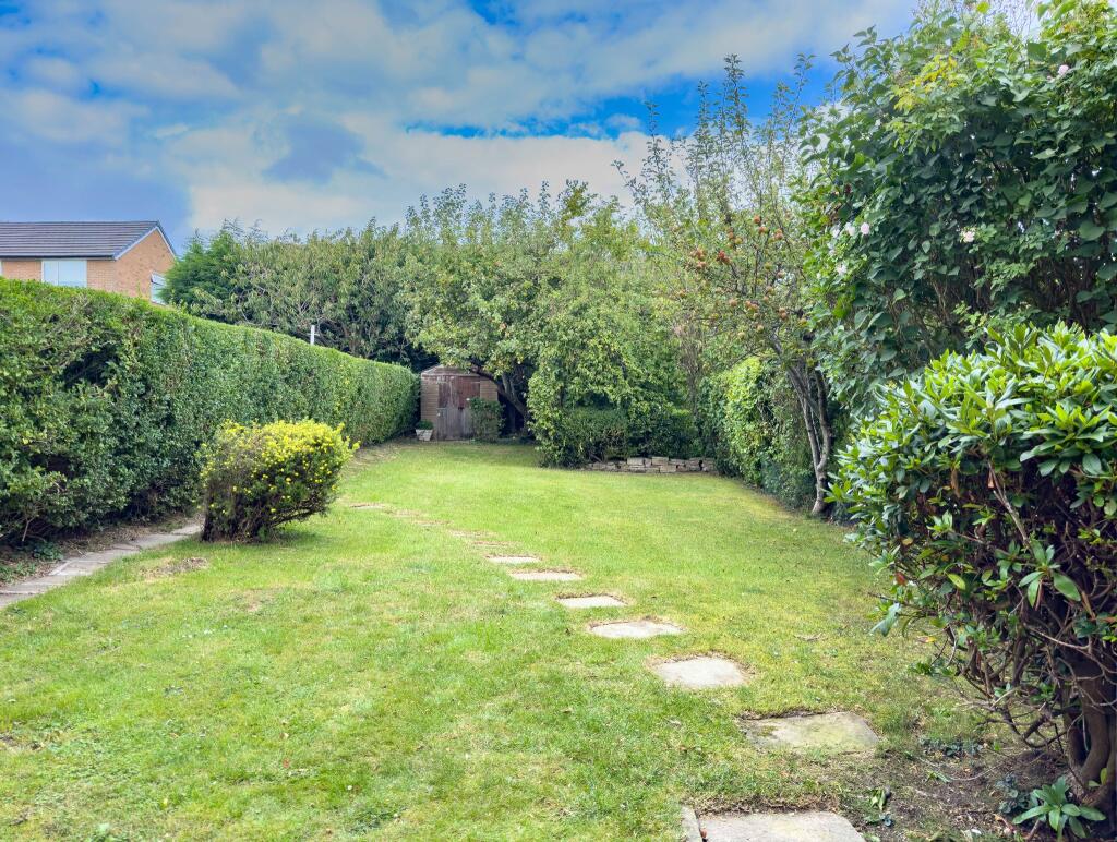 Lawned garden to the rear