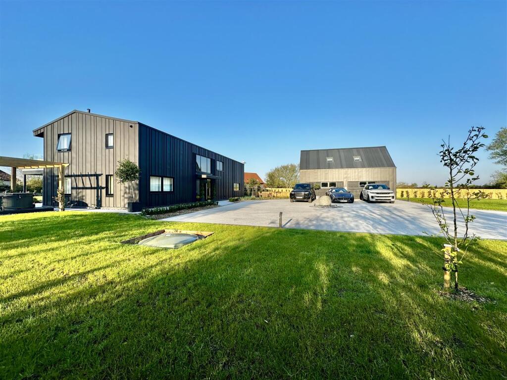 To The Front OF The Property