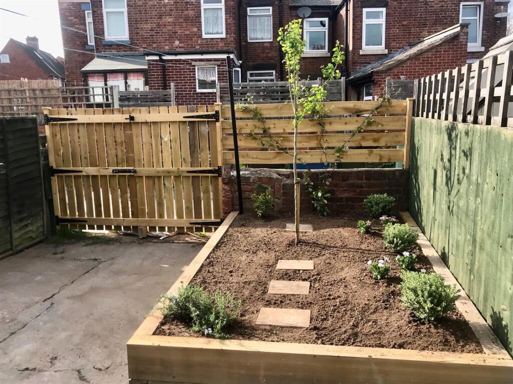 Rear garden - (ll supplied)