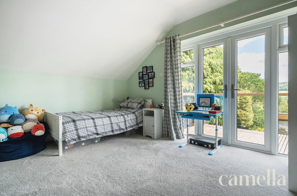 Bedroom Four With Balcony