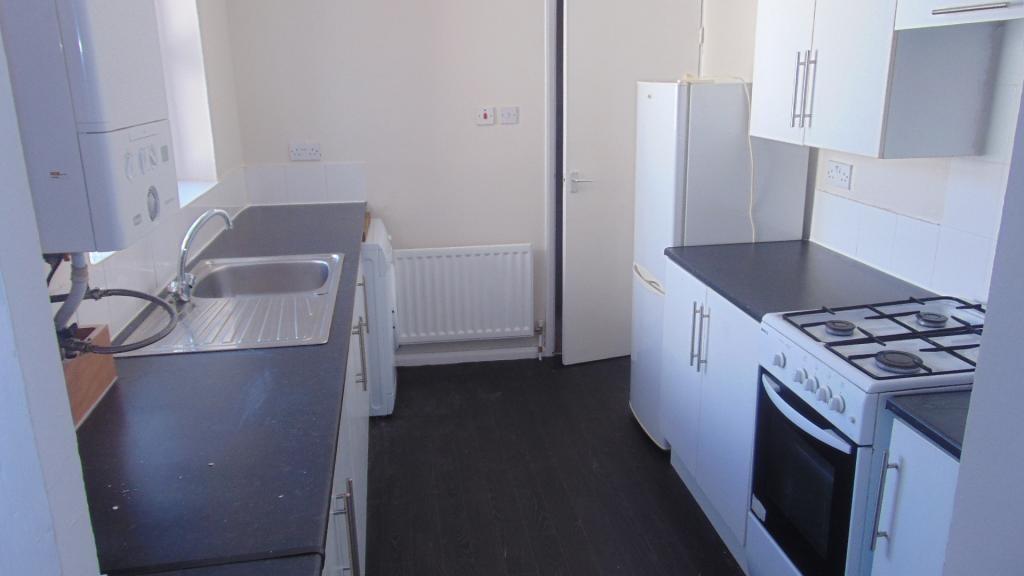 Bright and functional kitchen featuring modern ...