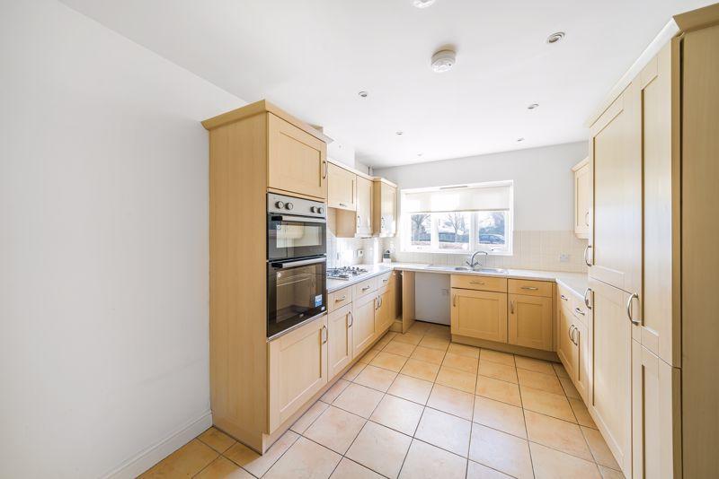 Kitchen with built-in appliances
