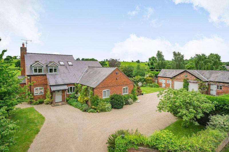 Charming Detached House with Outbuildings.