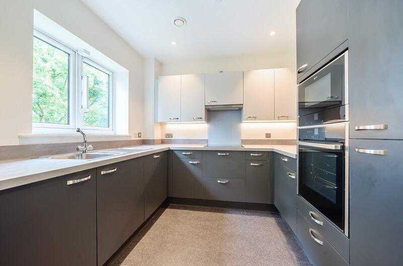 Kitchen with built-in appliances