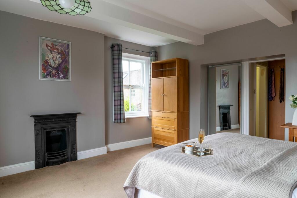 Master suite with feature fireplace