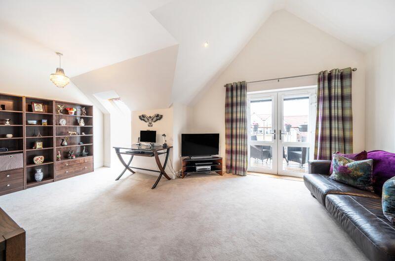 Living/dining room with balcony access