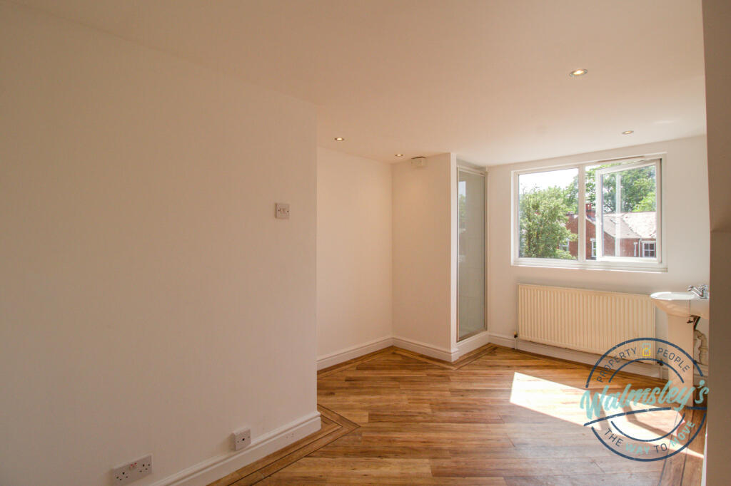Loft room with shower cubicle &amp; sink
