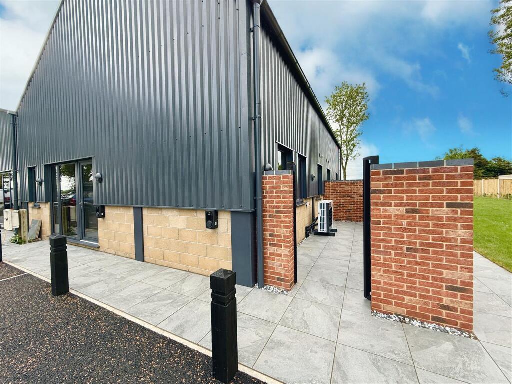 front aspect and courtyard to side