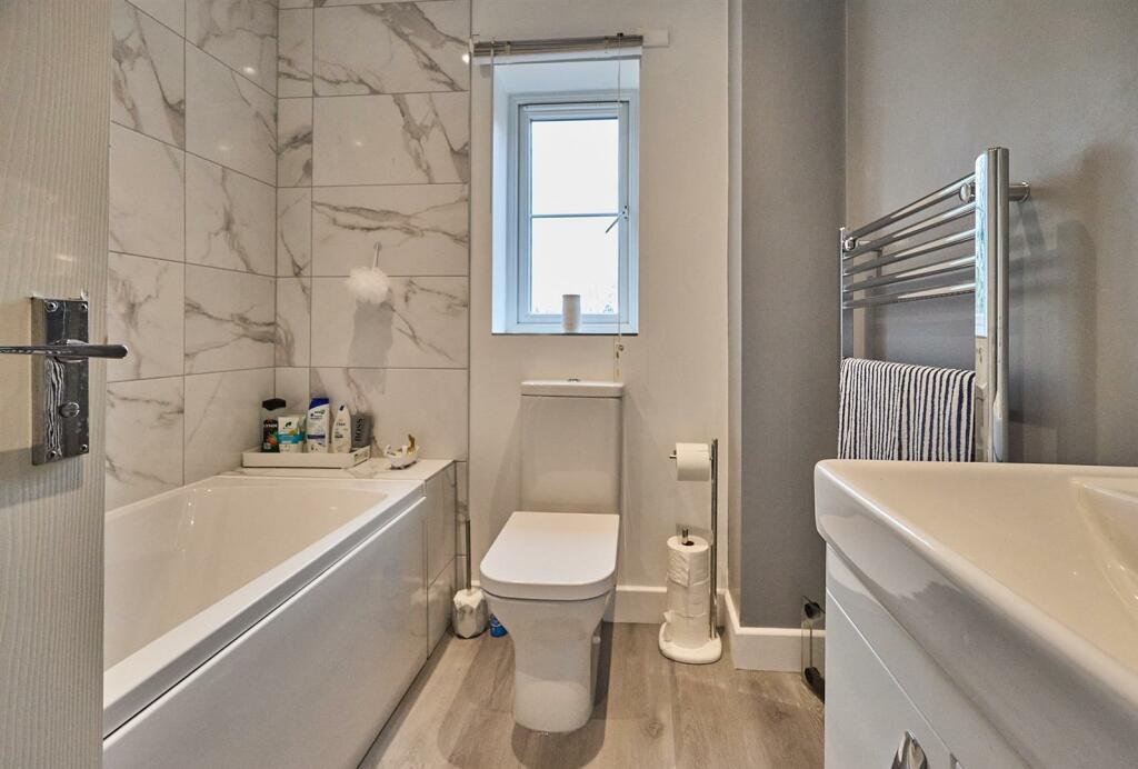 Re fitted bathroom to side