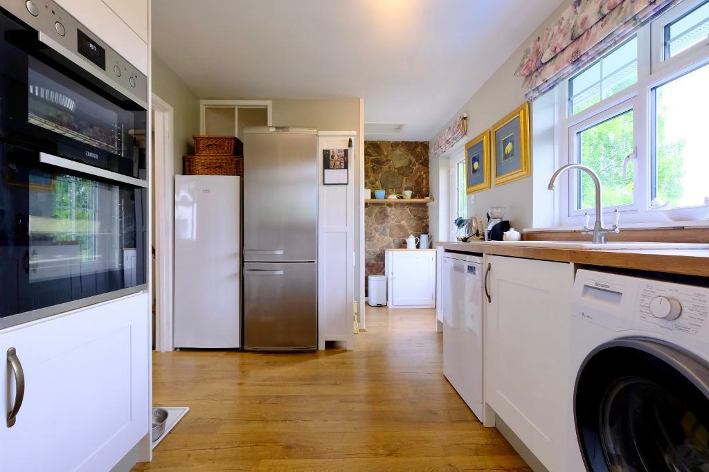 Kitchen with rear to balcony
