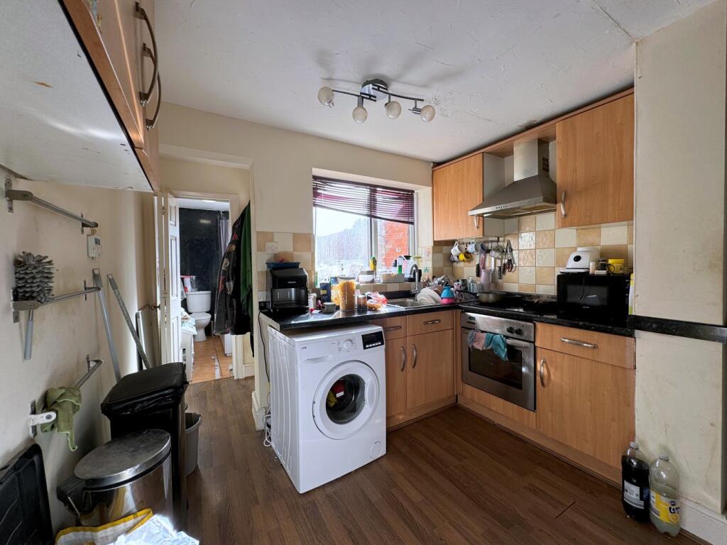 Kitchen open plan to Dining Room