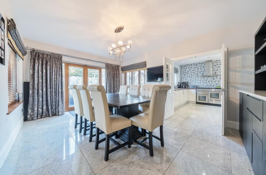 The superb Dining Room is the perfect space to ent