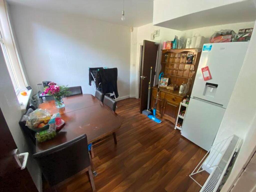 A bright and inviting kitchenette with a spacio...