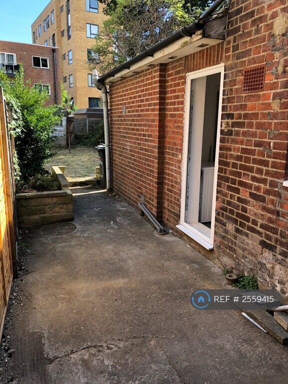 Rear Of House Leading To Garden