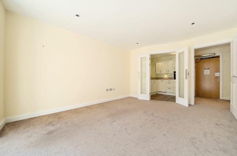 Living/dining room through to kitchen