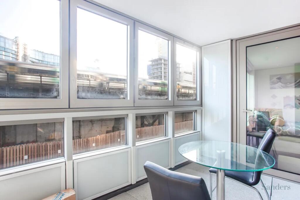 Bright and modern communal workspace featuring ...