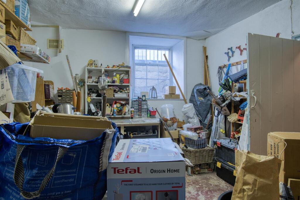 Basement Level - Storage / Workshop Room