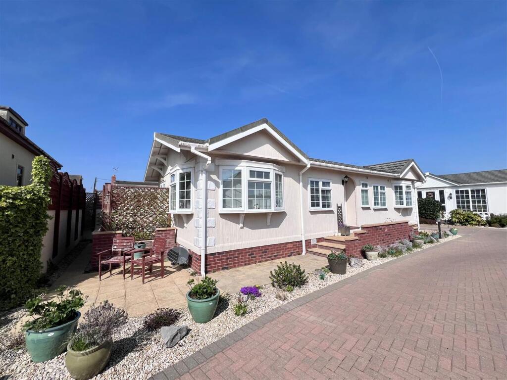 Front with Side Garden Area