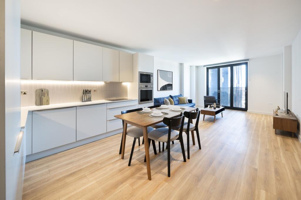 Experience elegant living with this bright and spacious open-plan kitchen and living area.