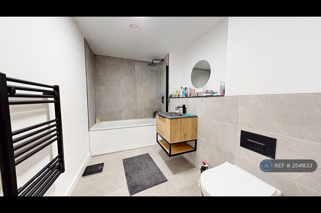 Spacious Main Bathroom With Bath