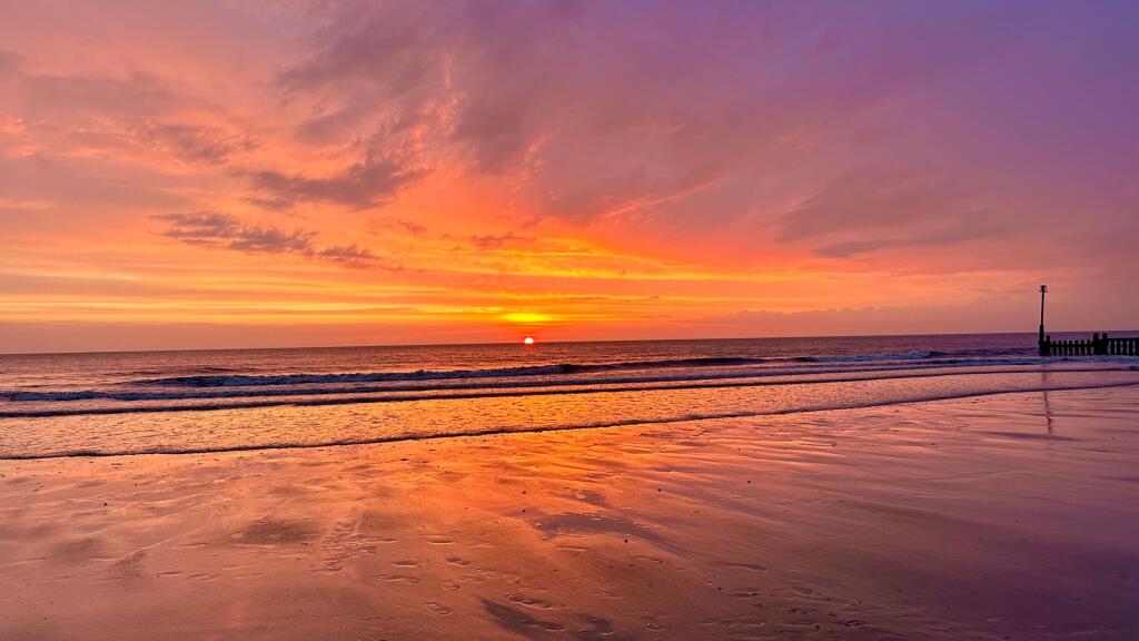 Sunrise picture taken on the beach directly beneath the cottage