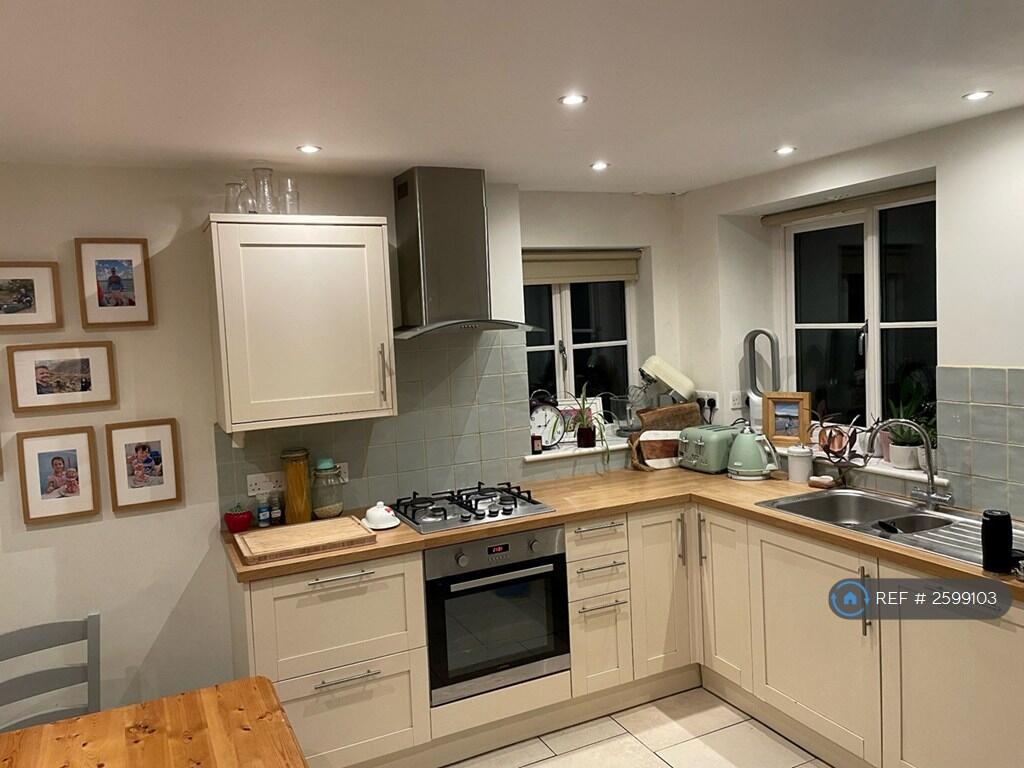 Kitchen With Outlook To Rear Garden