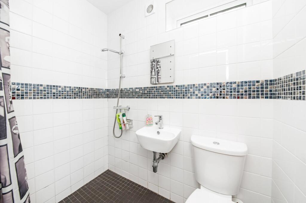 BEDROOM FIVE EN-SUITE WET ROOM