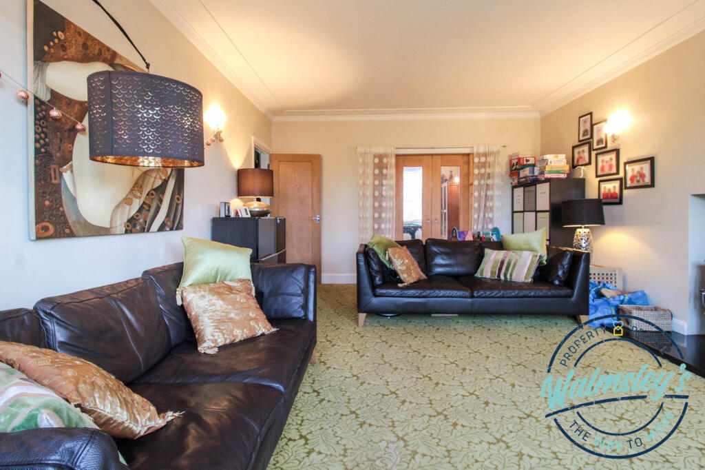 French doors between sitting rooms